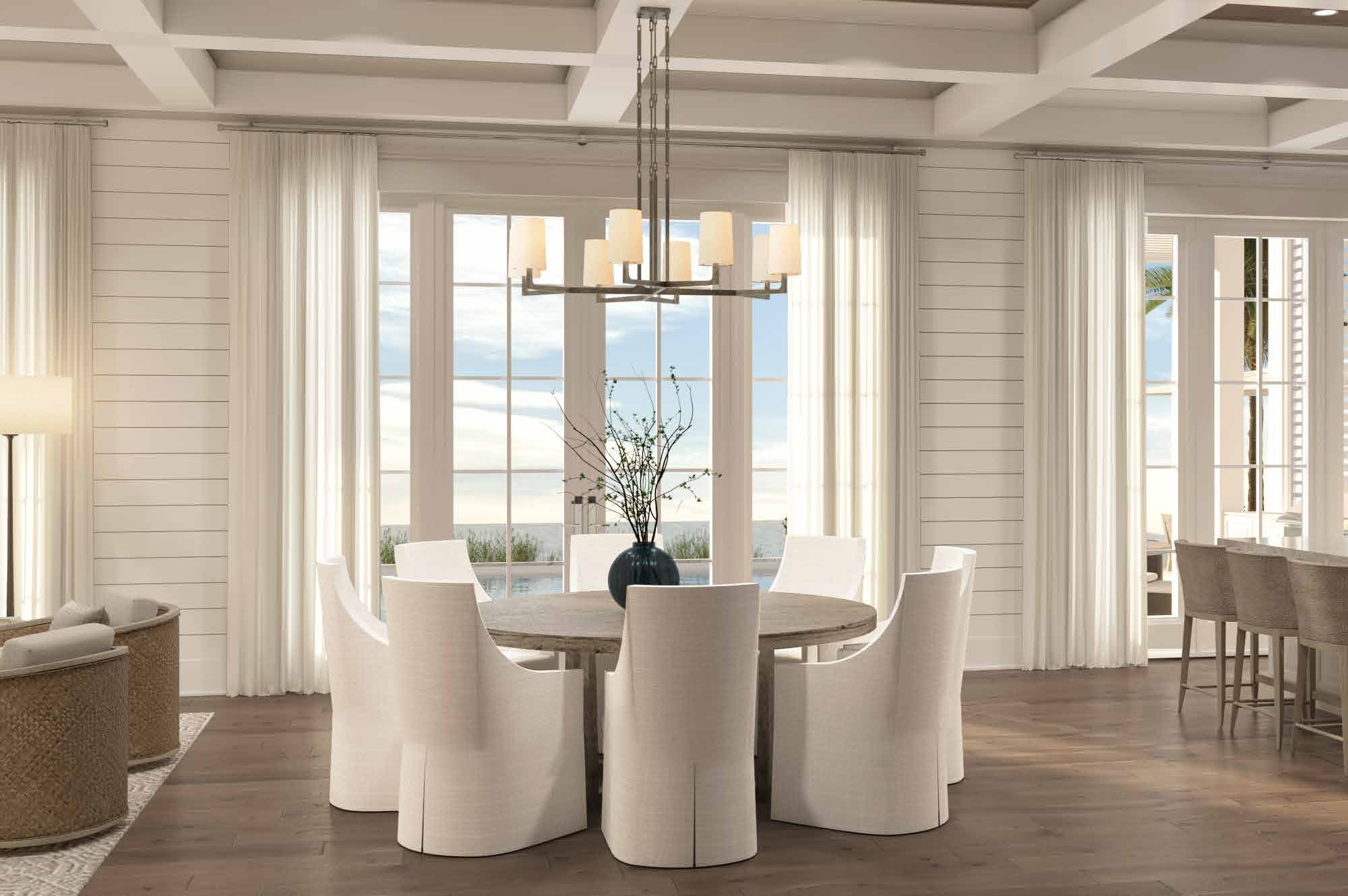 Dining room with round table and water views