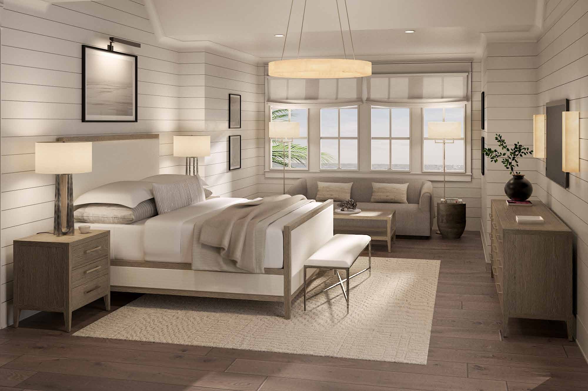 Primary bedroom with sitting area and water views